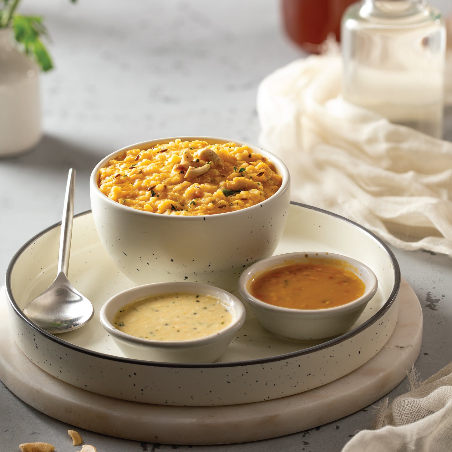 Tomato pongal with coconut chutney and sambar